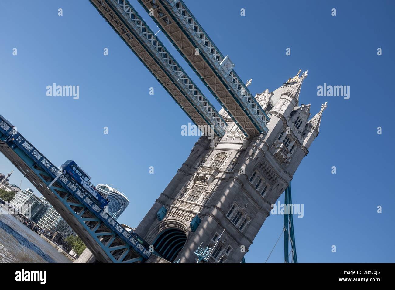 Tower Bridge London seen from river ferry at 45 degree angle. Stock Photo