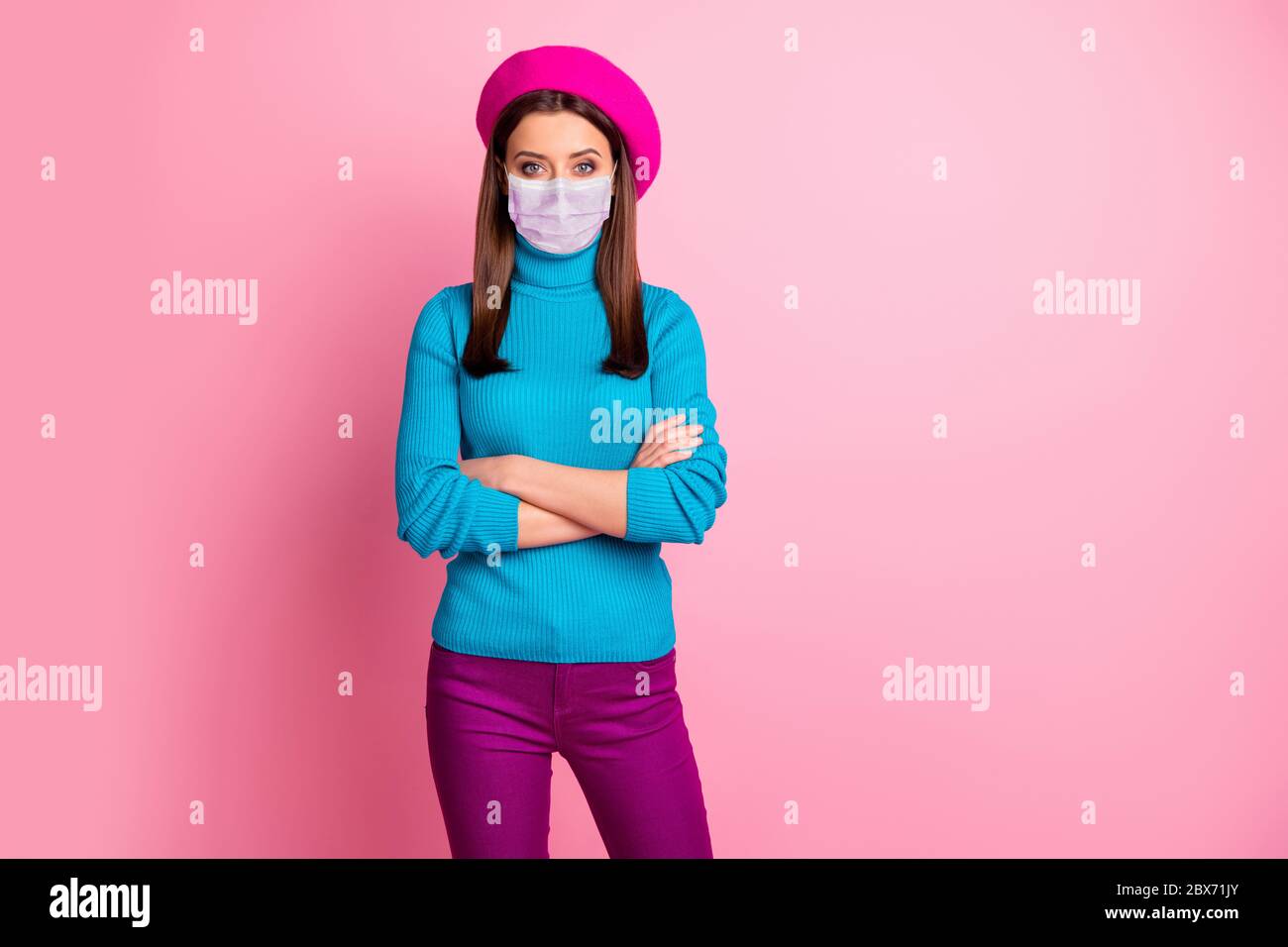 Portrait of her she nice attractive brown-haired girl folded arms wearing safety gauze mask stop flu flue china viral deadly syndrome air pollution Stock Photo