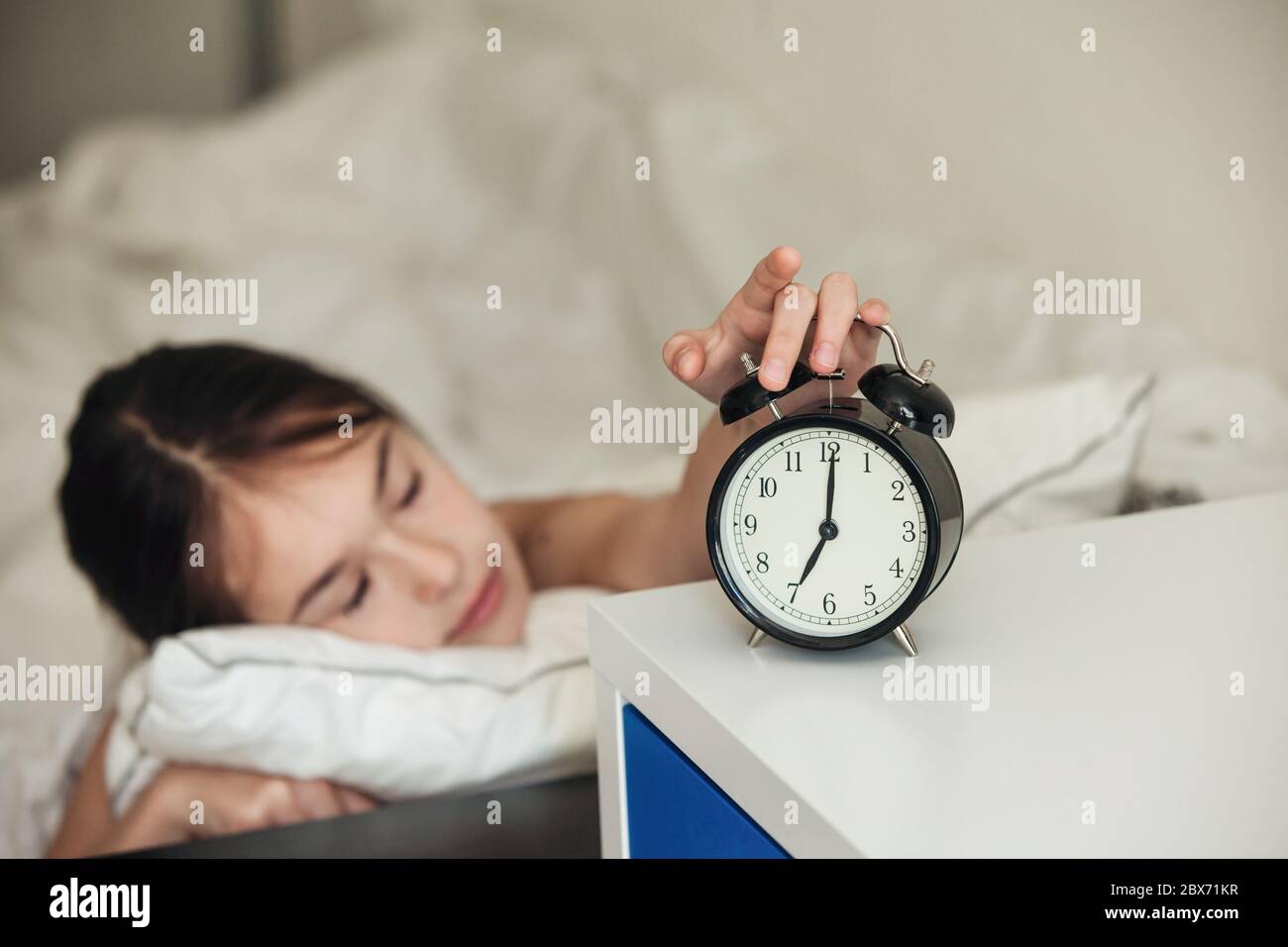 Child waking up alarm hires stock photography and images Alamy