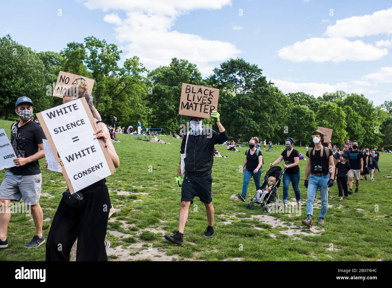 New York City, New York, USA - May 31, 2020: Peaceful protest demanding justice for the death of George Floyd, through Prospect Park, organized by Park Slope families, Brooklyn , New York City, USA. Stock Photo