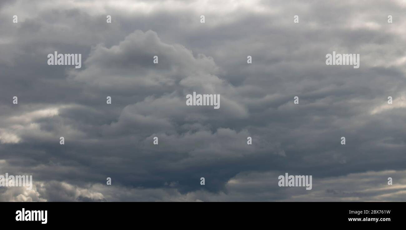 Dark clouds before a thunderstorm. Weather forecast, storm. Stock Photo
