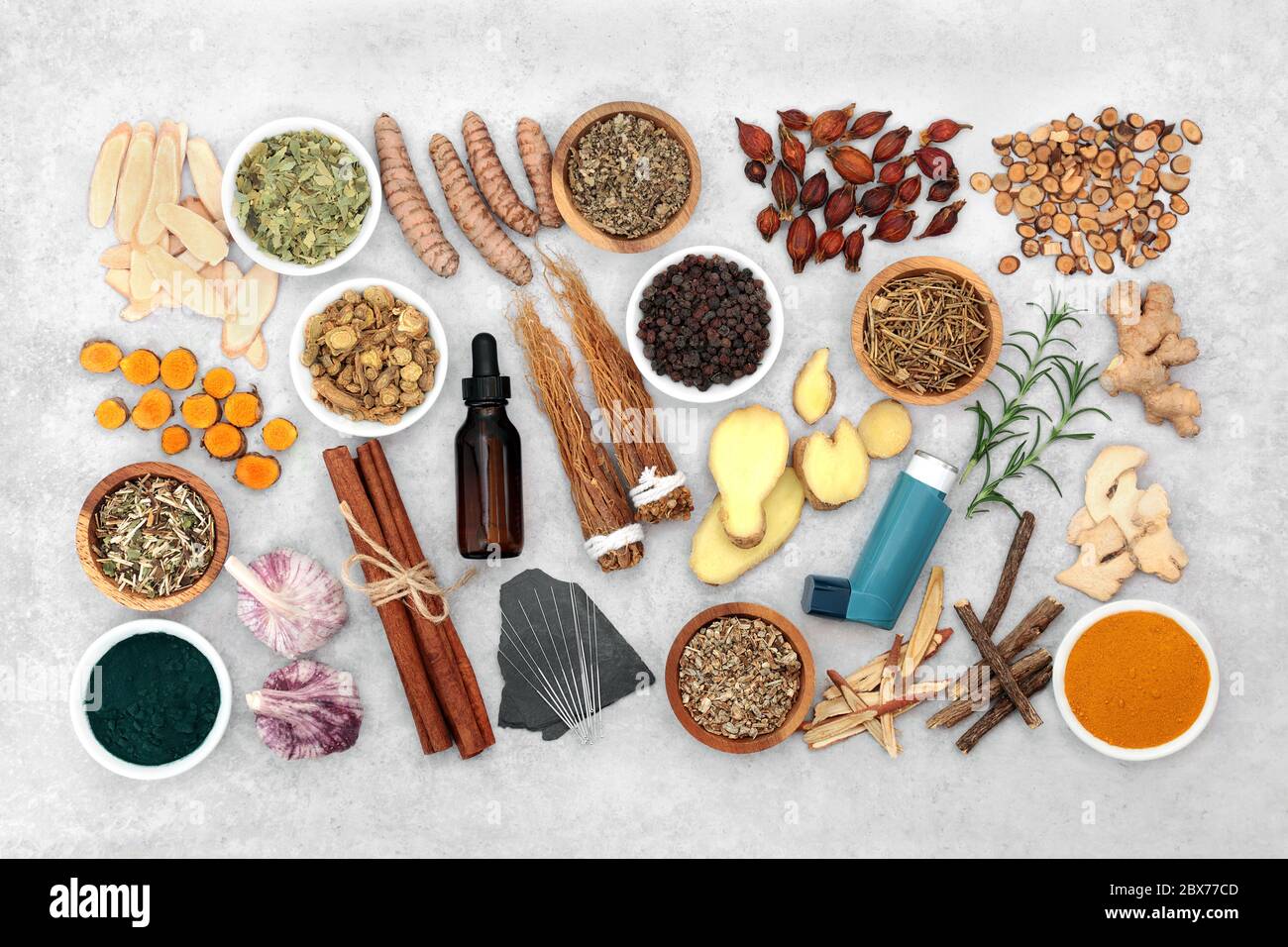 Herb and spice collection with acupuncture needles used in natural and chinese herbal medicine to treat asthma and respiratory diseases and medical in Stock Photo