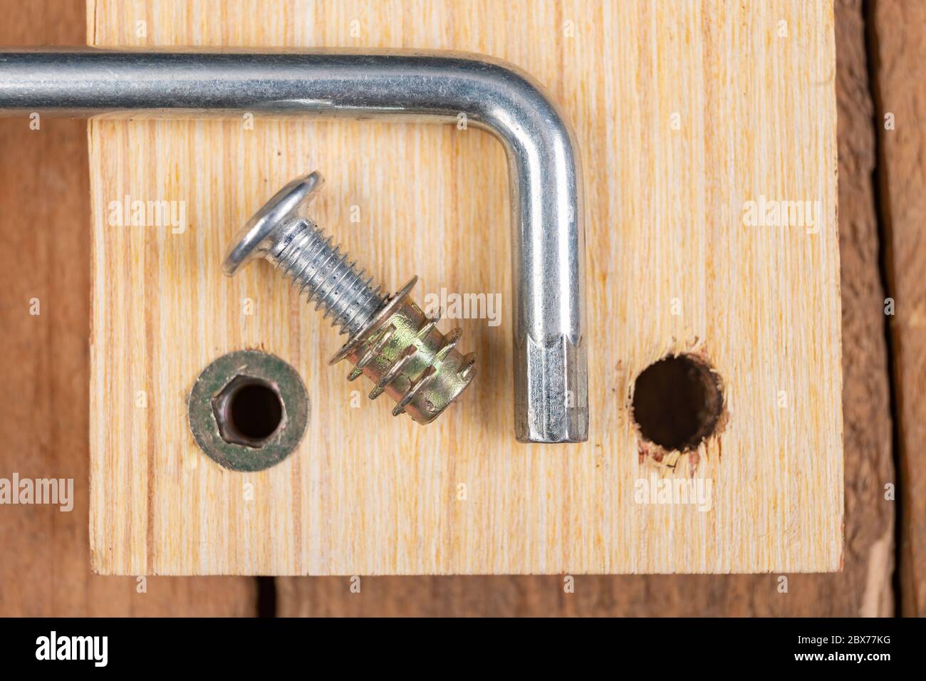 Special screws for joining wood. Carpentry accessories for building furniture. Workplace