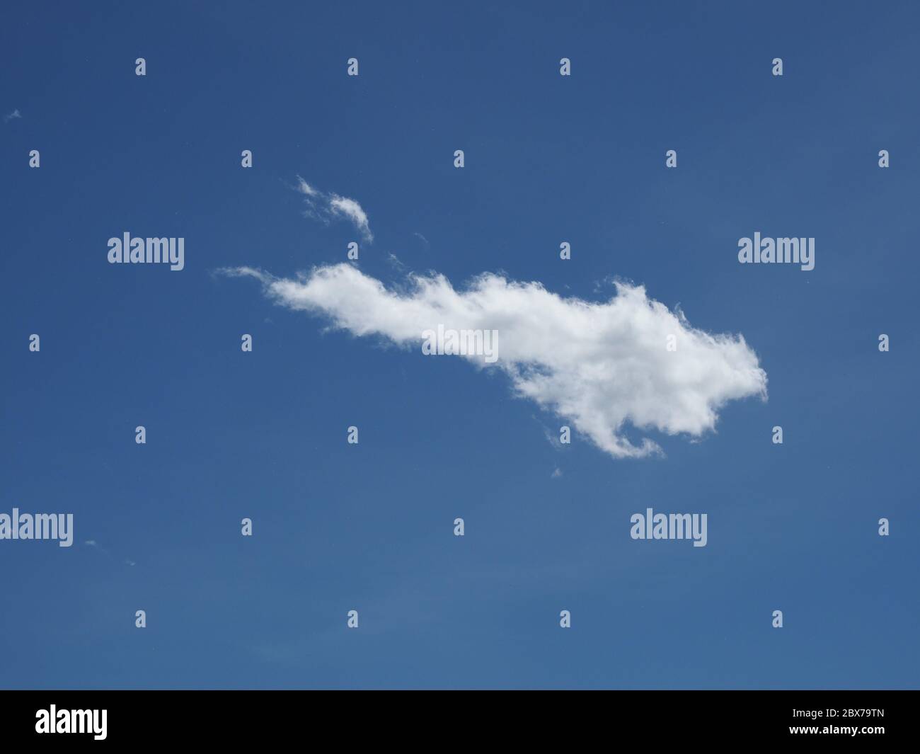 blue sky with cumulus clouds useful as a background Stock Photo - Alamy