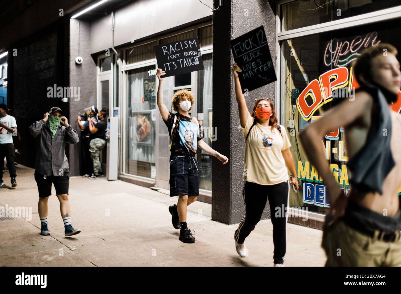 Dallas, Texas / United States - May 30 2020: Protestors march through