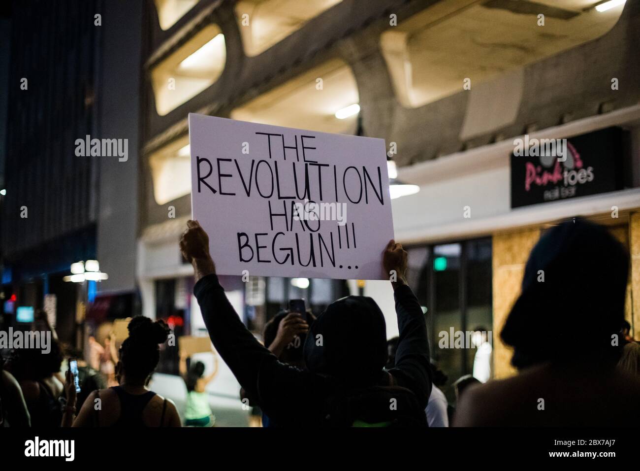 Dallas, Texas / United States - May 30 2020: Protestors march through