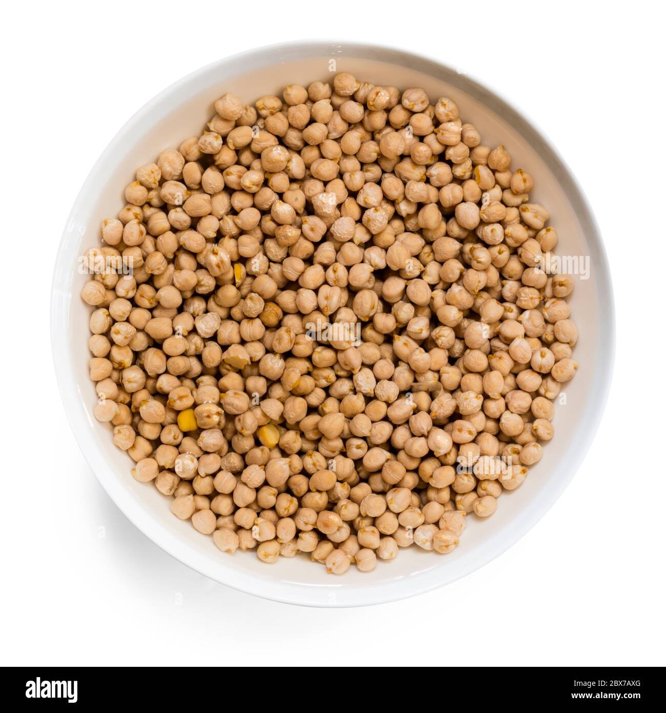 Uncooked chickpeas soaking in water, top view, isolated. Stock Photo