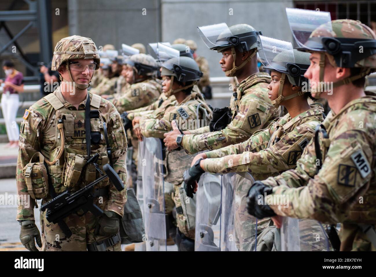 Atlanta, United States. 04th June, 2020. Georgia National Guardsmen stand with City of Atlanta SWAT team members to enforce a curfew following days of protests and riots over the death of George Floyd near Centennial Olympic Park June 4, 2020 in Atlanta, Georgia. Floyd was choked to death by police in Minneapolis resulting in protests sweeping across the nation. Credit: MSgt. Roger Parsons/National Guard/Alamy Live News Stock Photo