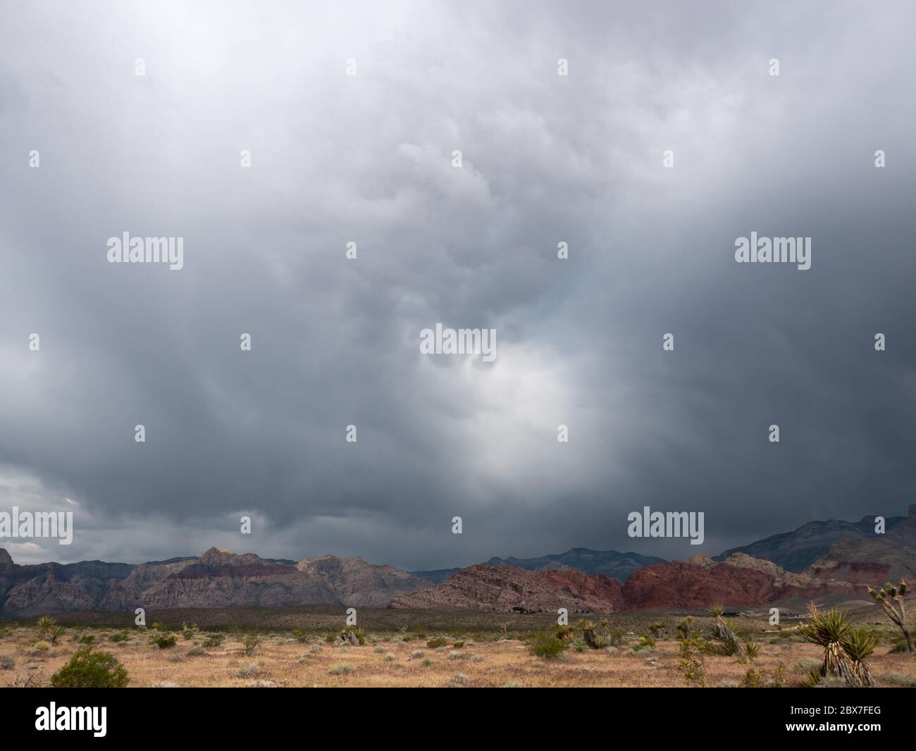 Spring storm clouds moving across the desert Stock Photo