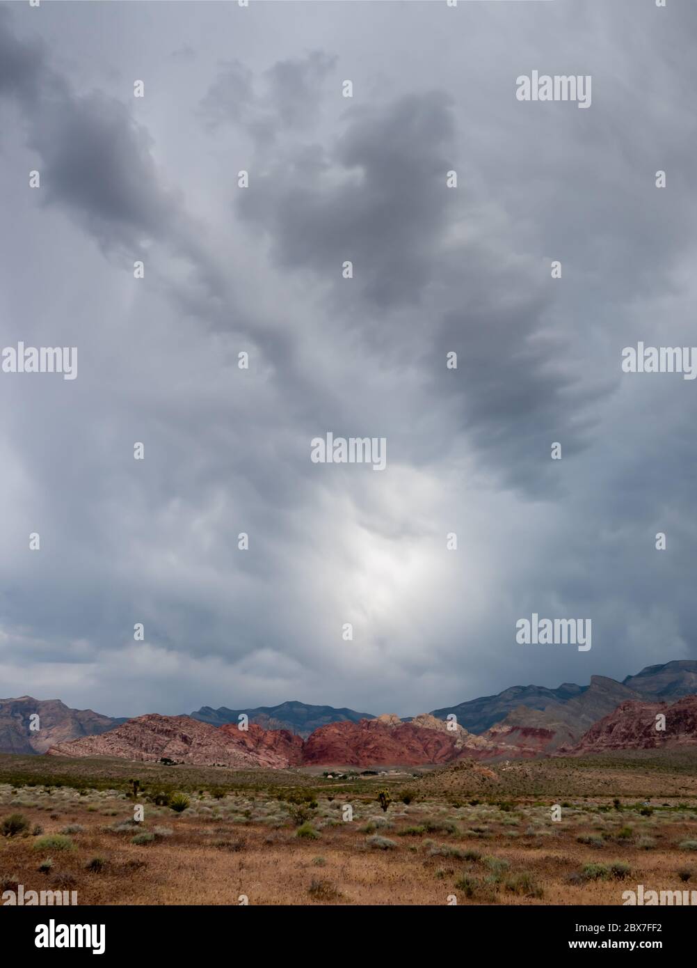 Spring storm clouds moving across the desert Stock Photo