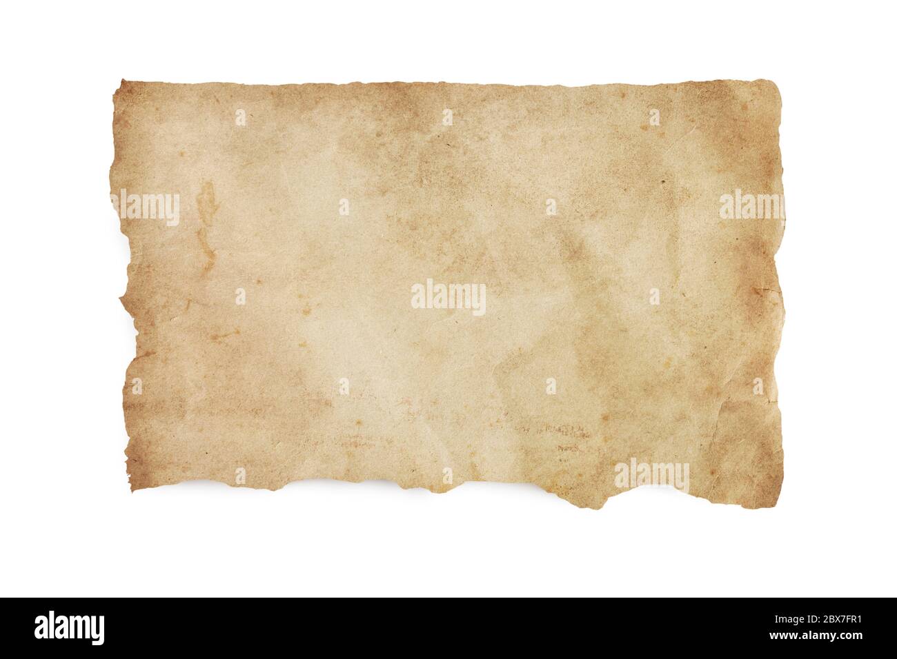 Torn old stained paper with clipping path.  isolated on white with soft shadow. Stock Photo
