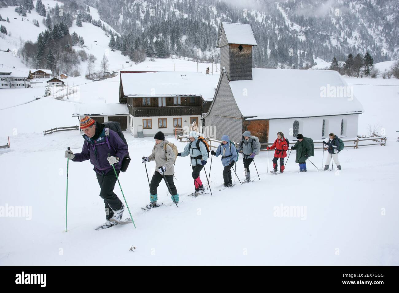 SNOWSHOE HIKE IN BAVARIA Stock Photo