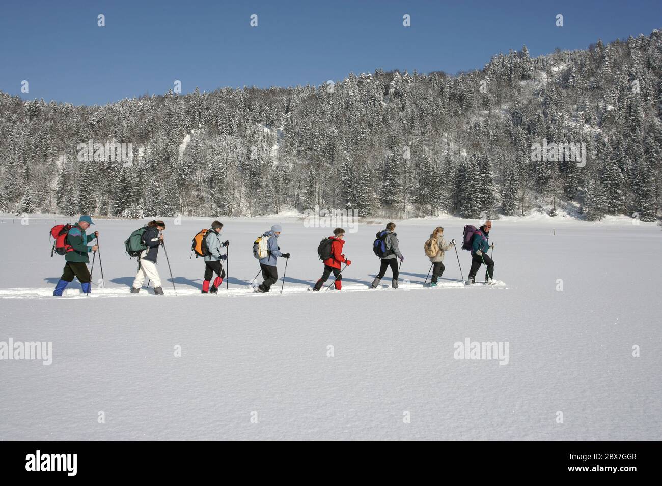 SNOWSHOE HIKE IN BAVARIA Stock Photo