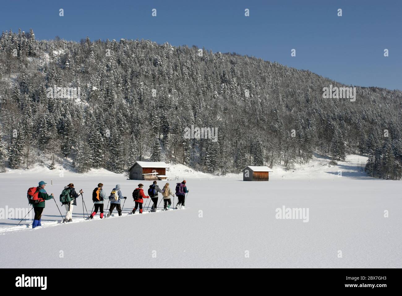 SNOWSHOE HIKE IN BAVARIA Stock Photo