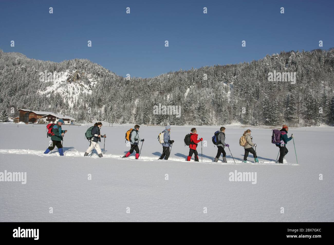 SNOWSHOE HIKE IN BAVARIA Stock Photo