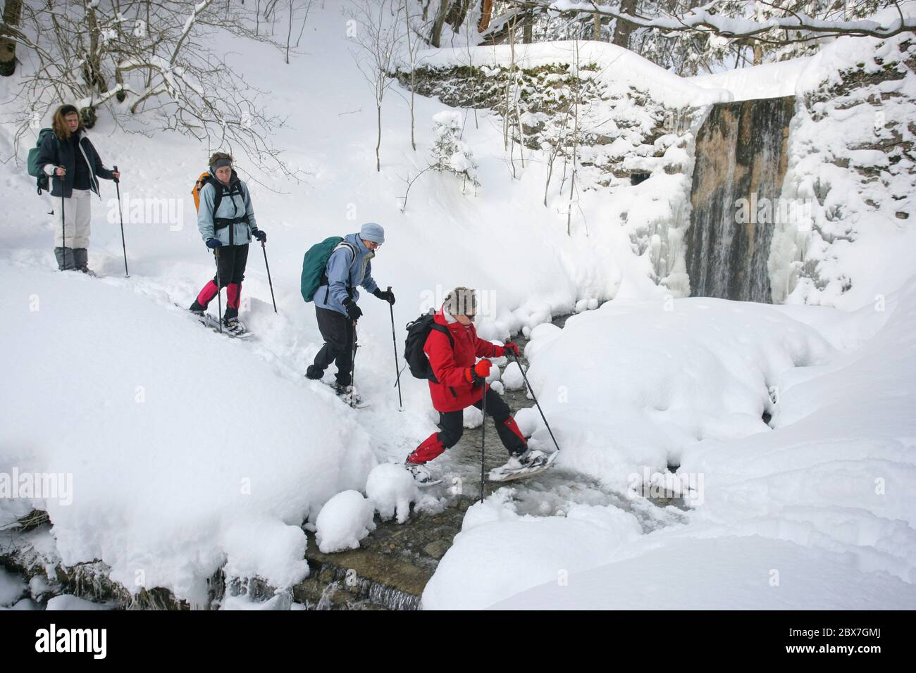 SNOWSHOE HIKE IN BAVARIA Stock Photo