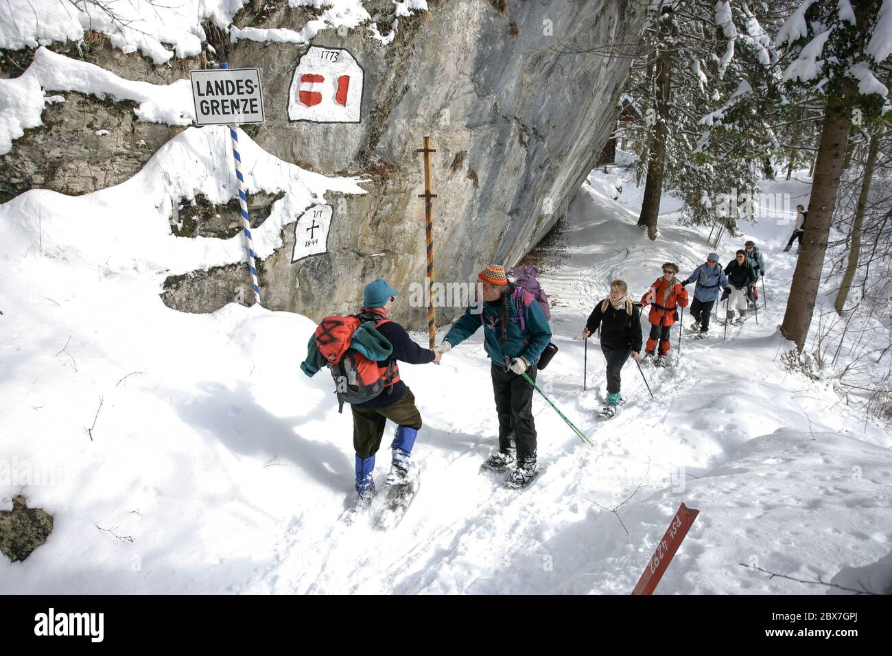 SNOWSHOE HIKE IN BAVARIA Stock Photo