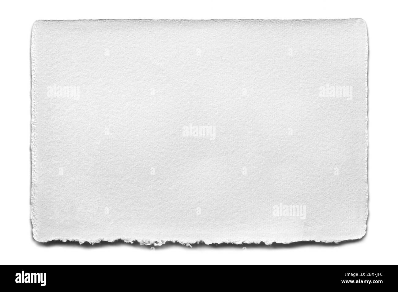 Torn blank white paper, isolated with soft shadow.  Lots of copy-space, great textures, large file. Stock Photo