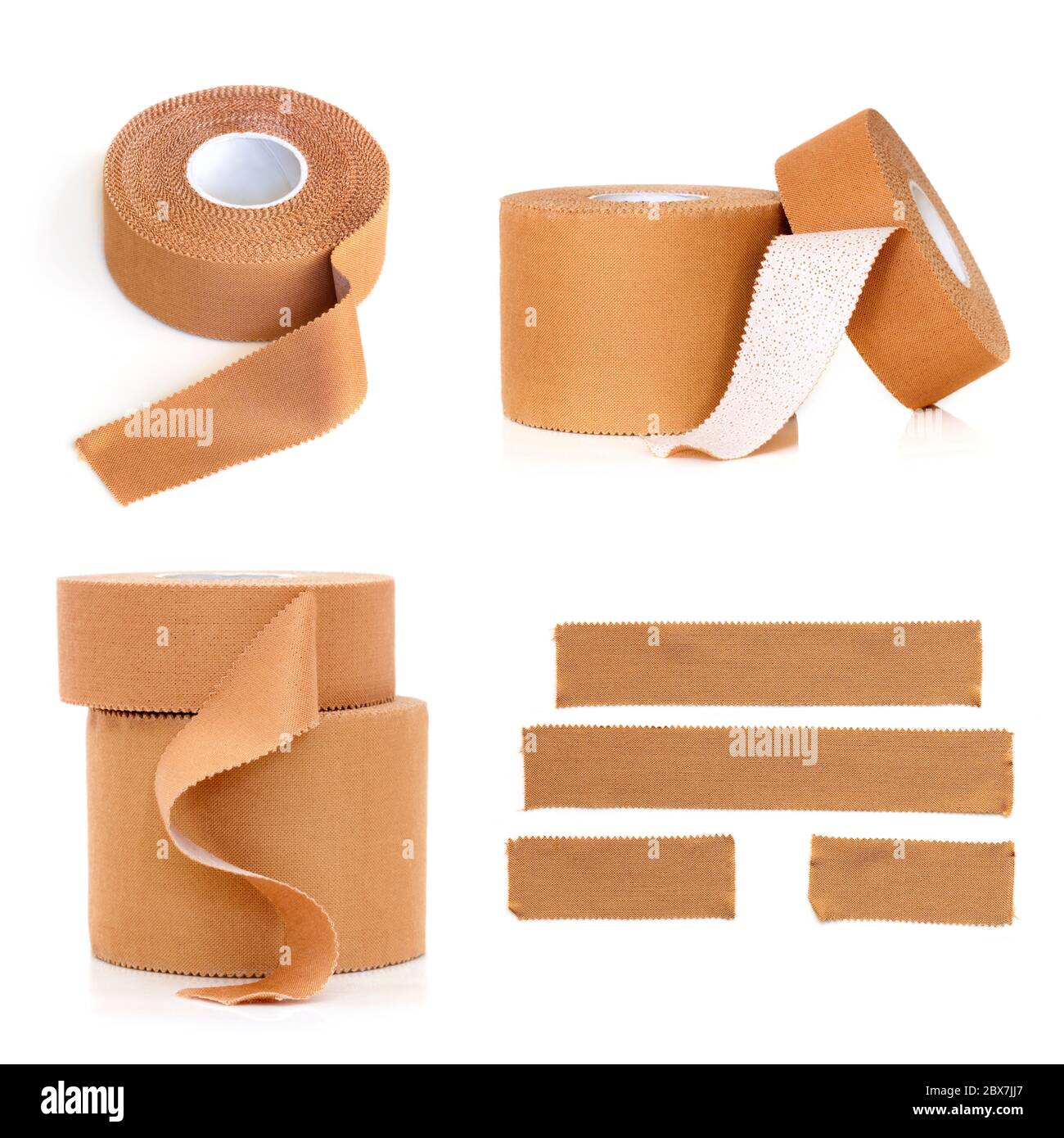 Rolls and strips of physio strapping tape, isolated on white Stock