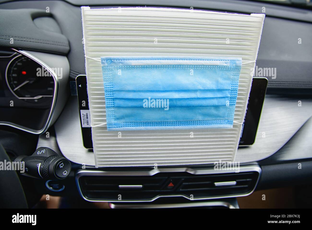car air conditioner air filter and a protective mask against bacteria on it Stock Photo Alamy
