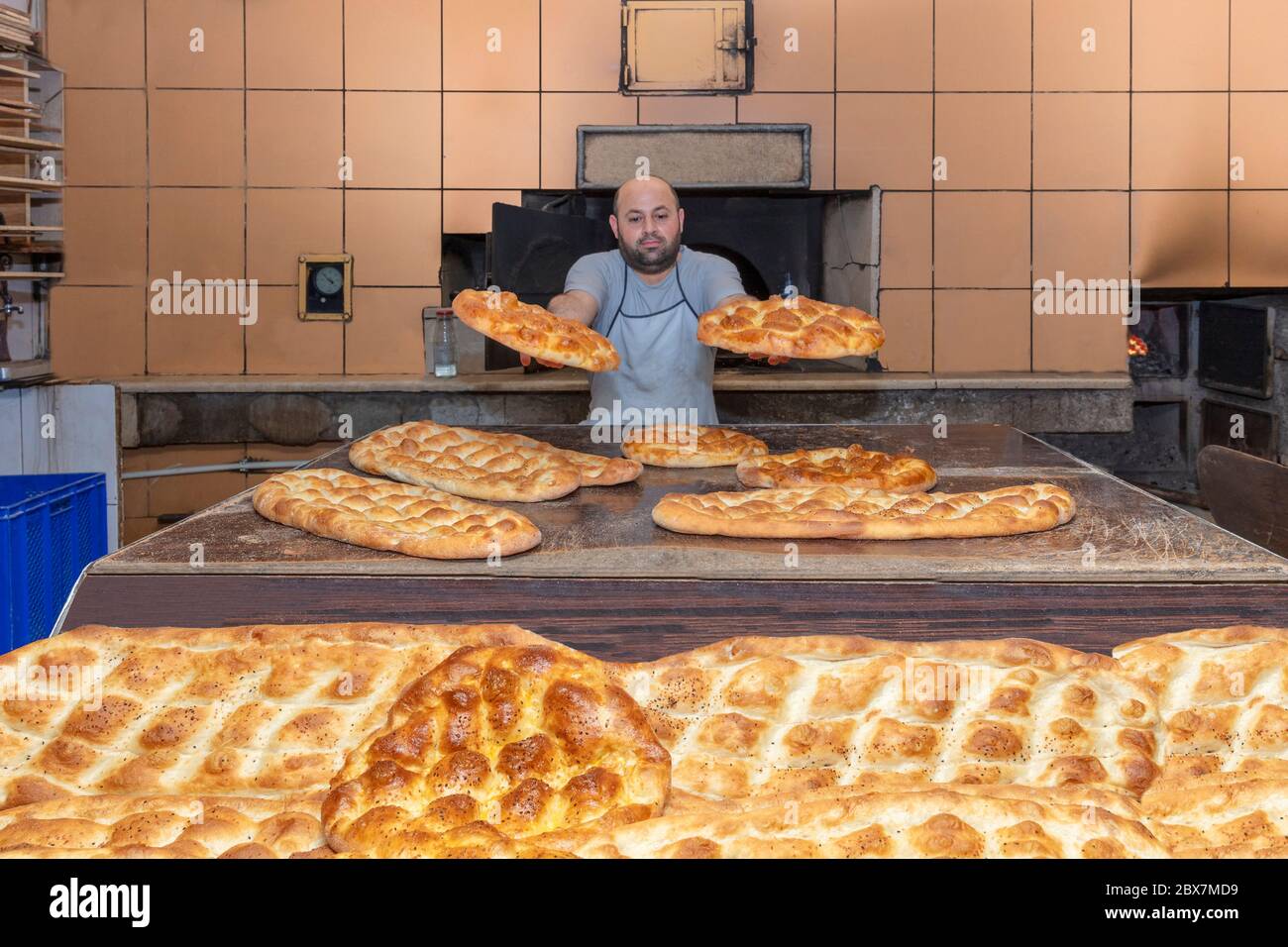 Turkish pita bread in tandoor (clay oven) in Istanbul Turkey Stock Photo -  Alamy