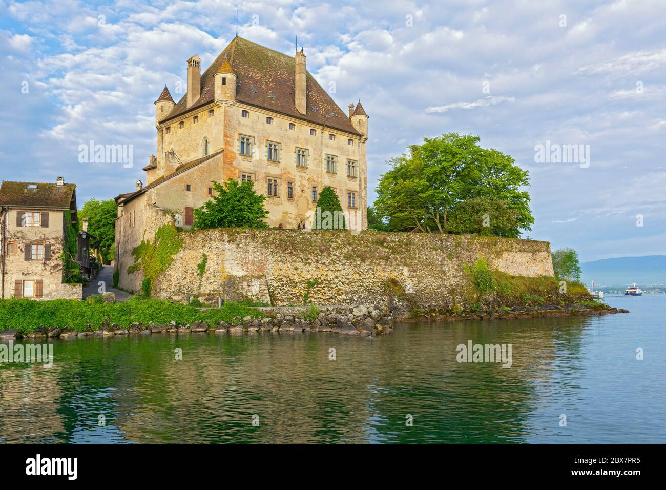 France, Yvoire, Port des Pecheurs, Chateau (castle) 14C, early morning Stock Photo