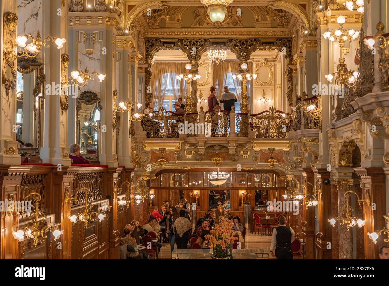Budapest, Hungary - Feb 09, 2020: Luxury golden hall inside New York Cafe Stock Photo