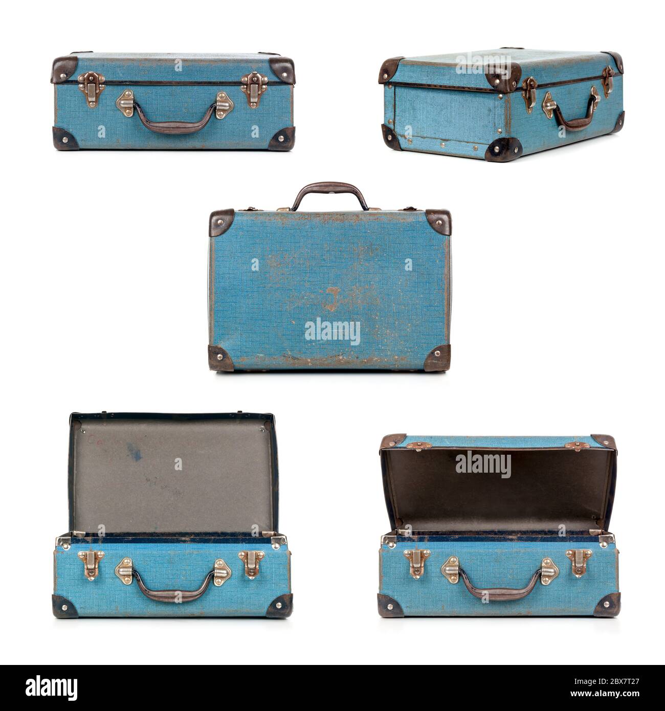 Small blue vintage suitcase in different views, isolated on white.  My old childhood school case. Stock Photo
