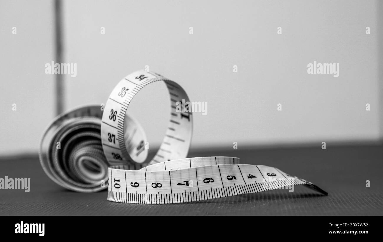 Sewing measure tape Black and White Stock Photos & Images - Alamy