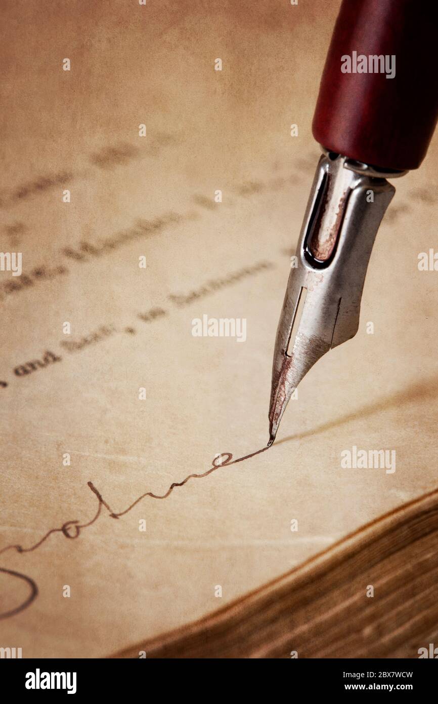 Vintage nib pen, signing old paper. Grunge effects Stock Photo - Alamy