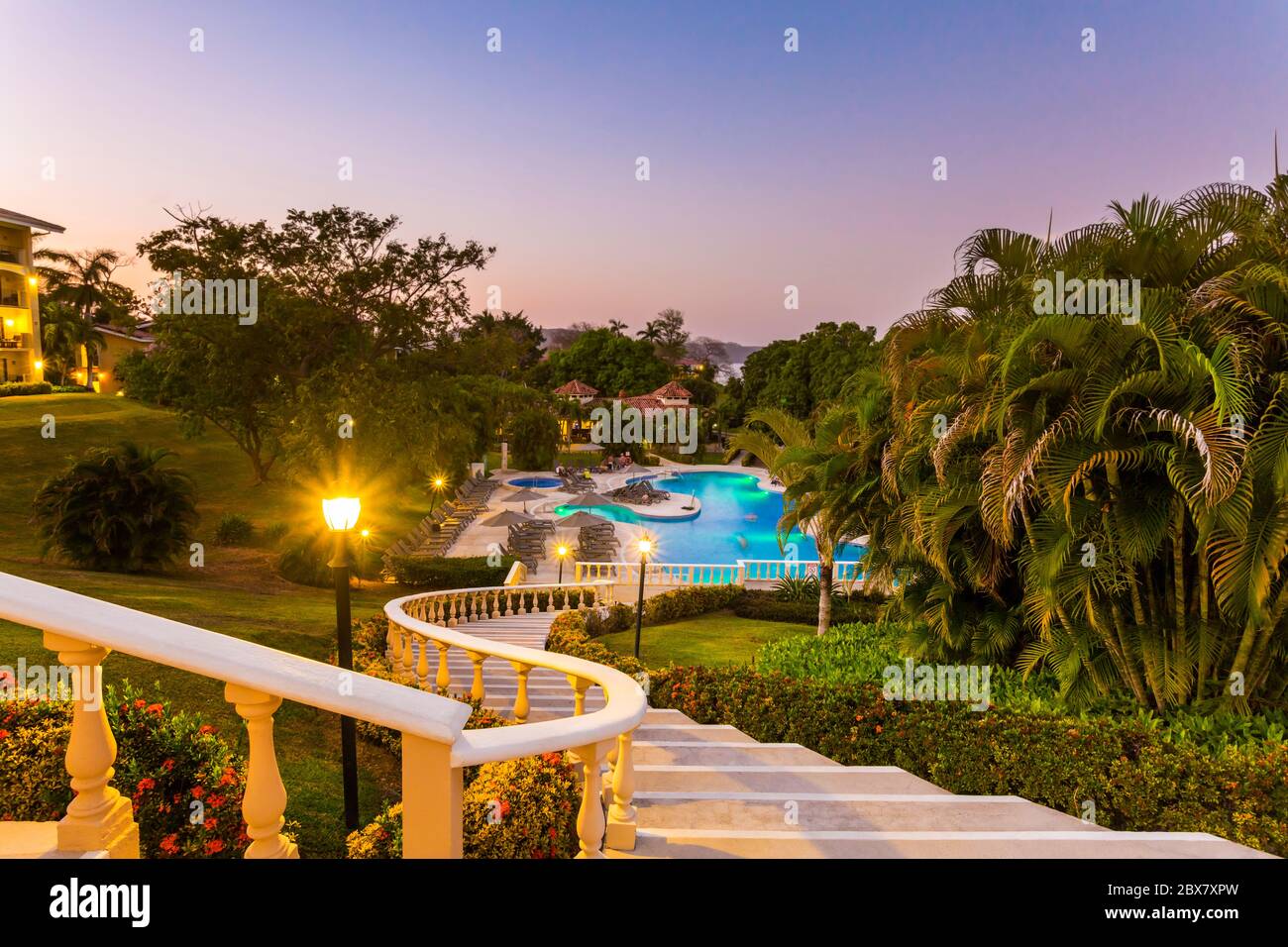 swimming pool with winding staircase, Occidental Papagayo Hotel, Guanacaste; Costa Rica; Central America Stock Photo