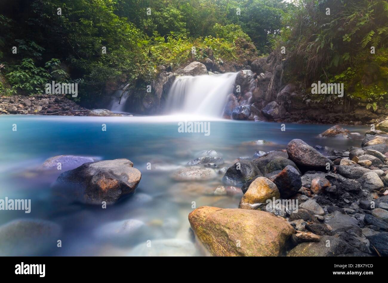 Aguilar Blue Waterfall, Sensoria, tropical rainforest reserve, Rincon de la Vieja, Provincia de Alajuela, Costa Rica Stock Photo