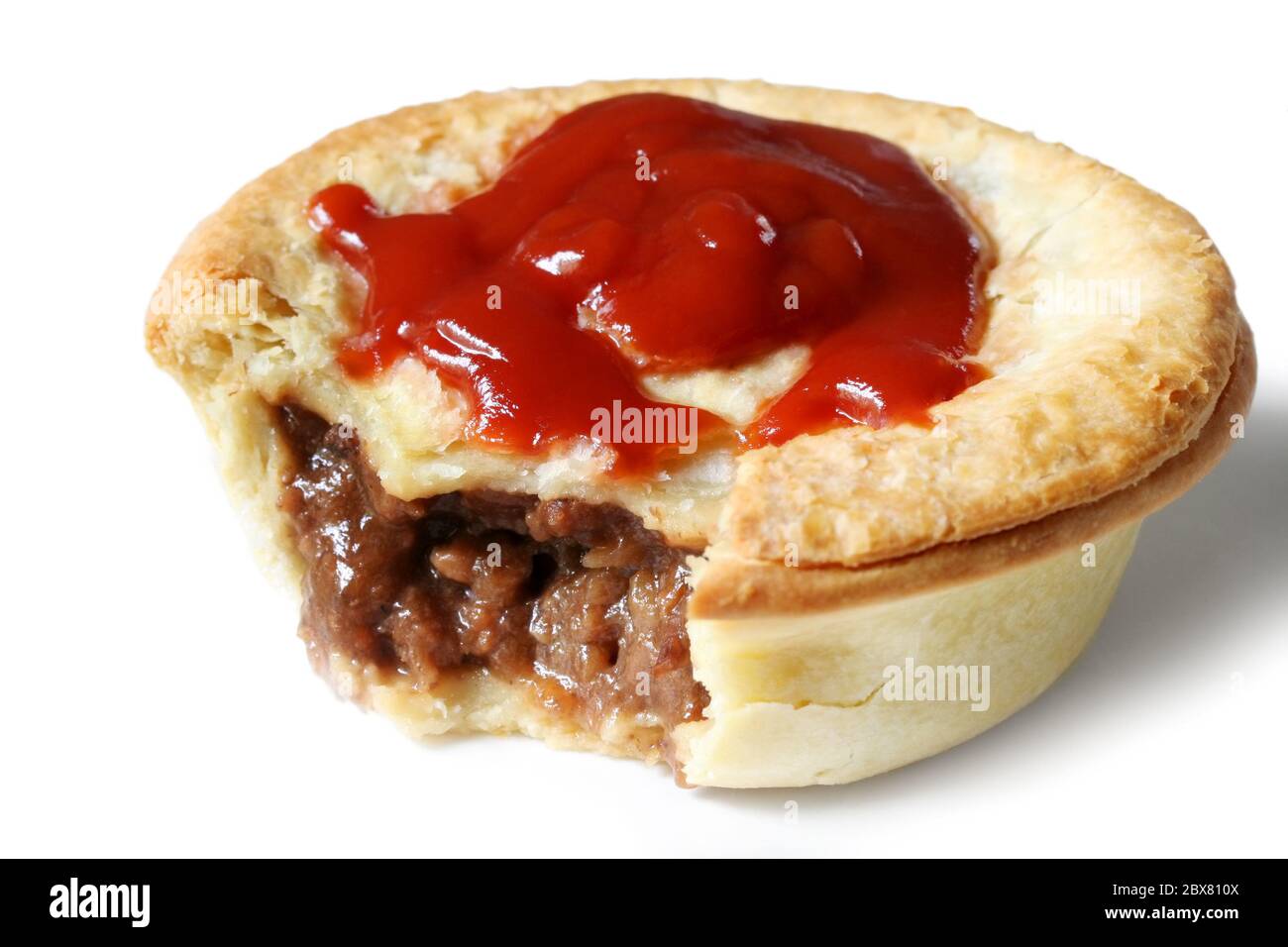 Australian meat pie and tomato Photo Alamy