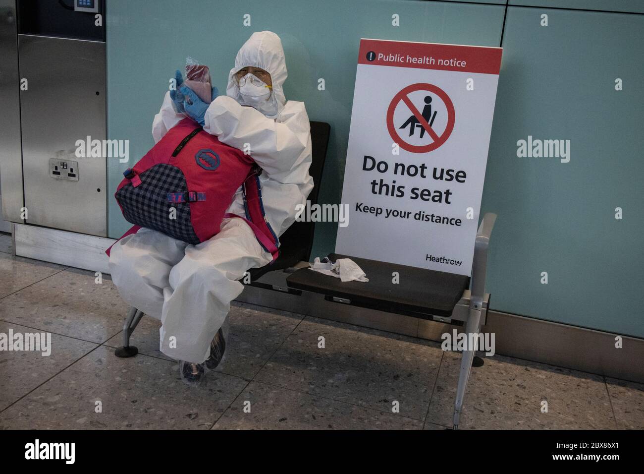 Travellers wait to travel out of Heathrow before the quarantine restrictions are implemented and people returning must self-isolate for two weeks. Stock Photo