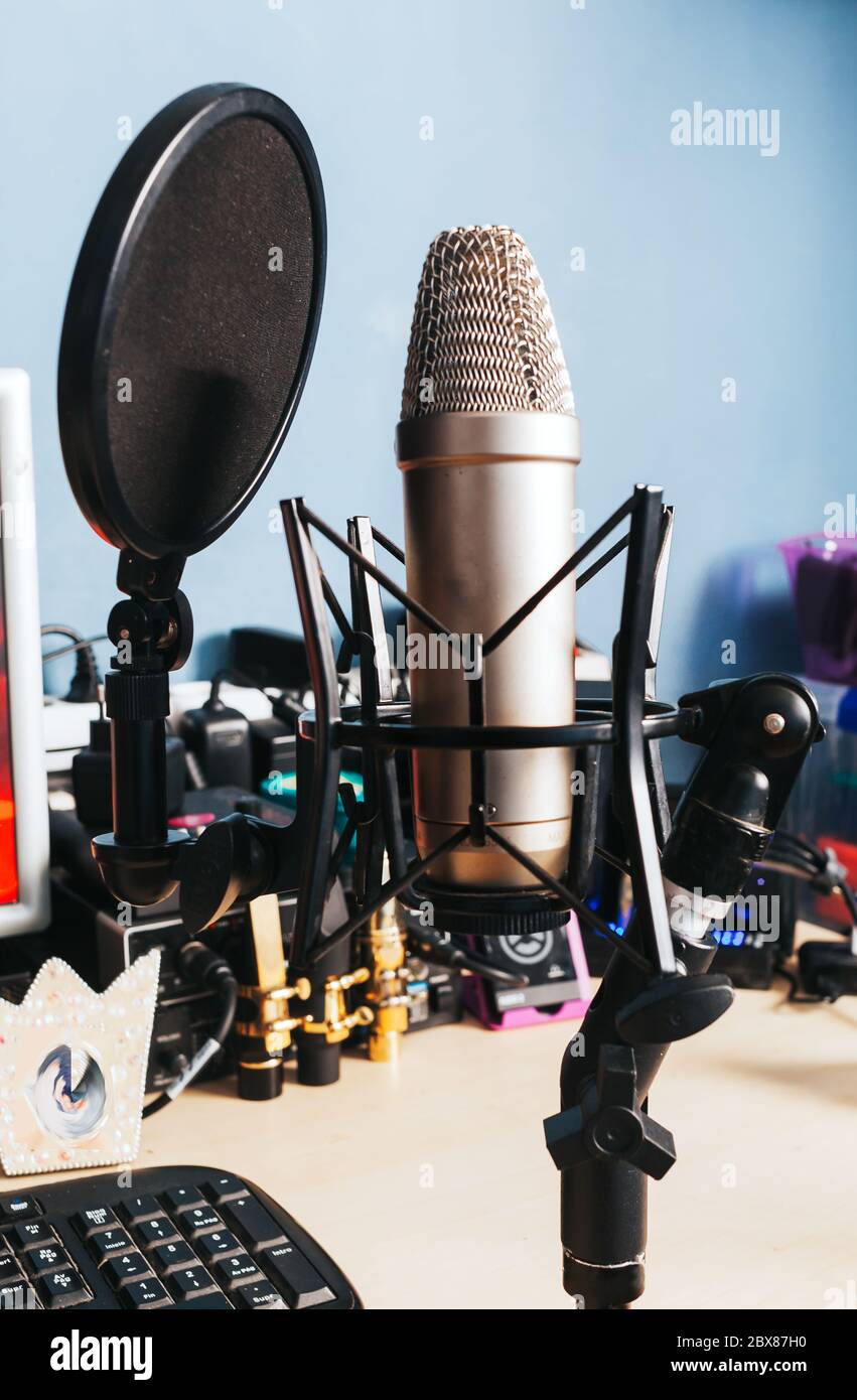 condenser microphone on a desk table stand - studio microphone Stock Photo