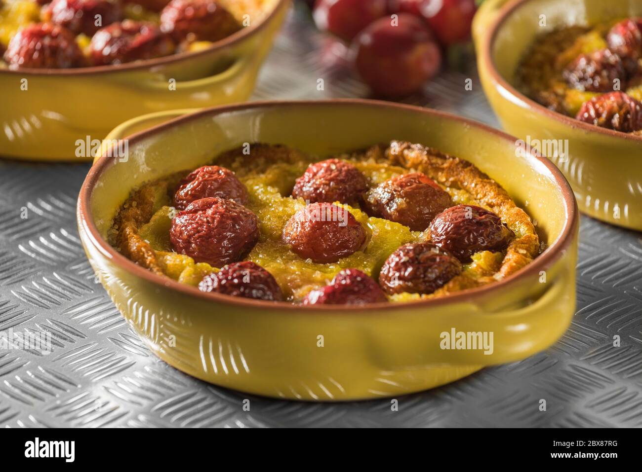 Individual cherry clafoutis. Fruit dessert Stock Photo