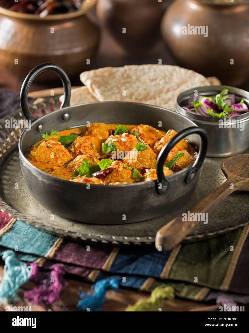 Rajasthani Gatta curry. Gram flour dumplings in yogurt sauce. India Food Stock Photo