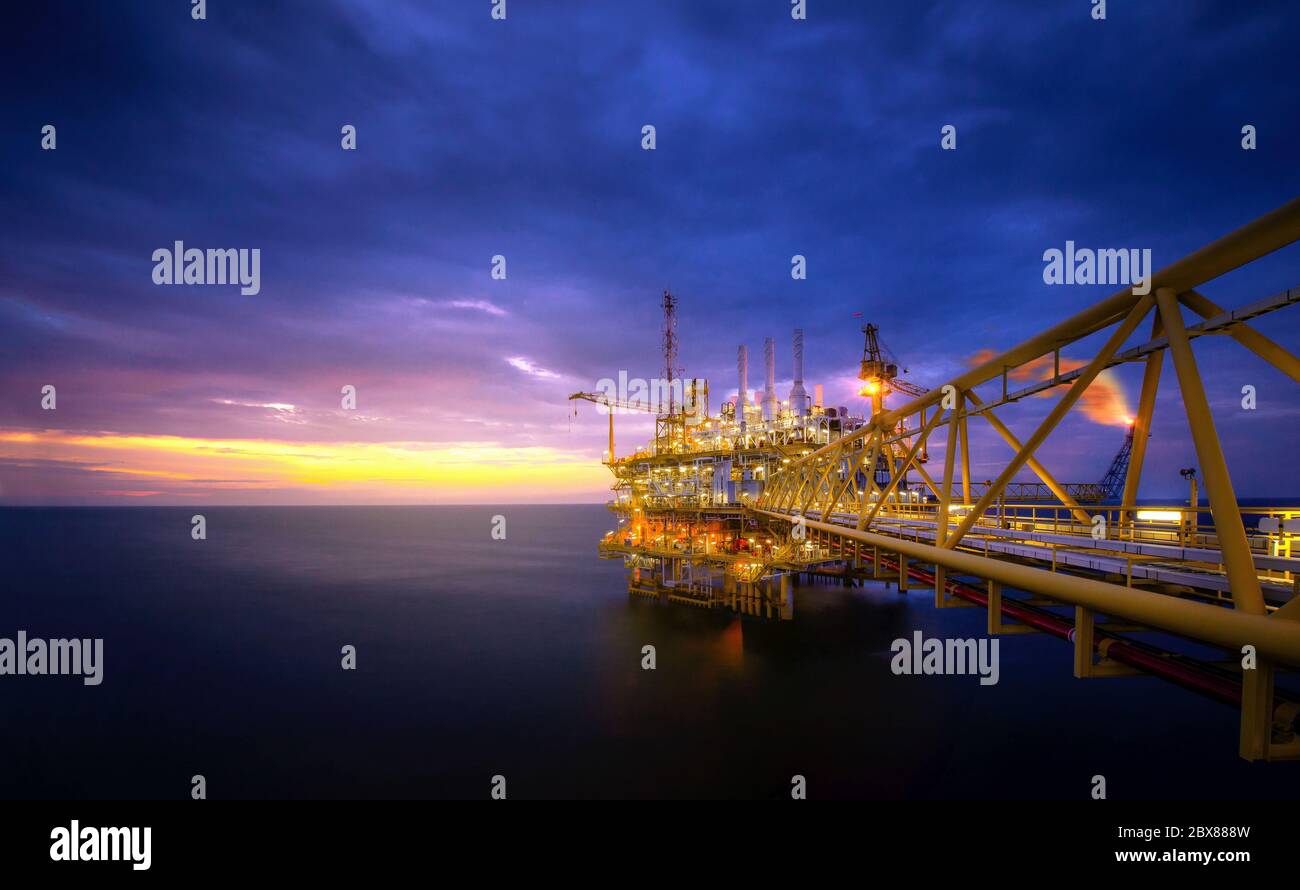 Industry of oil offshore jack up rig at gulf in the time after sunset. Stock Photo