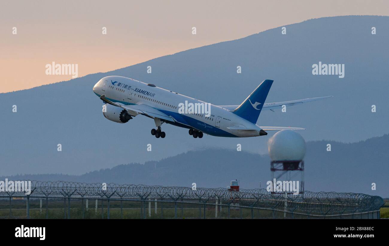 Richmond, British Columbia, Canada. 19th May, 2020. A XiamenAir (Xiamen Airlines) Boeing 787-8 Dreamliner jet (B-2768) takes off from Vancouver International Airport. Credit: Bayne Stanley/ZUMA Wire/Alamy Live News Stock Photo