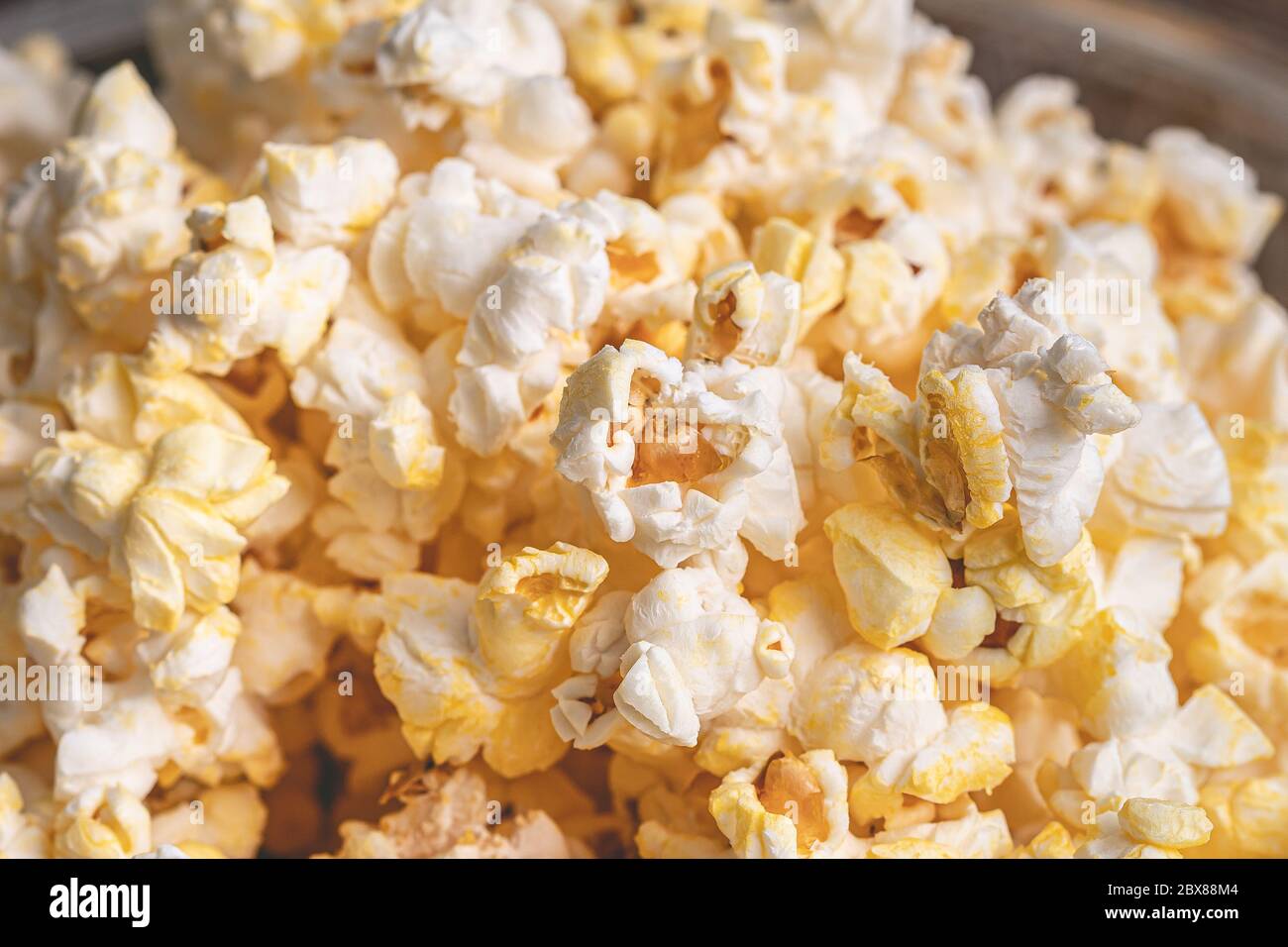Buttered popcorn in macro photography. Stock Photo
