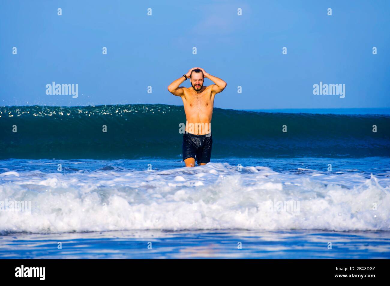 Man in swimming trunks isolated hires stock photography and images Alamy
