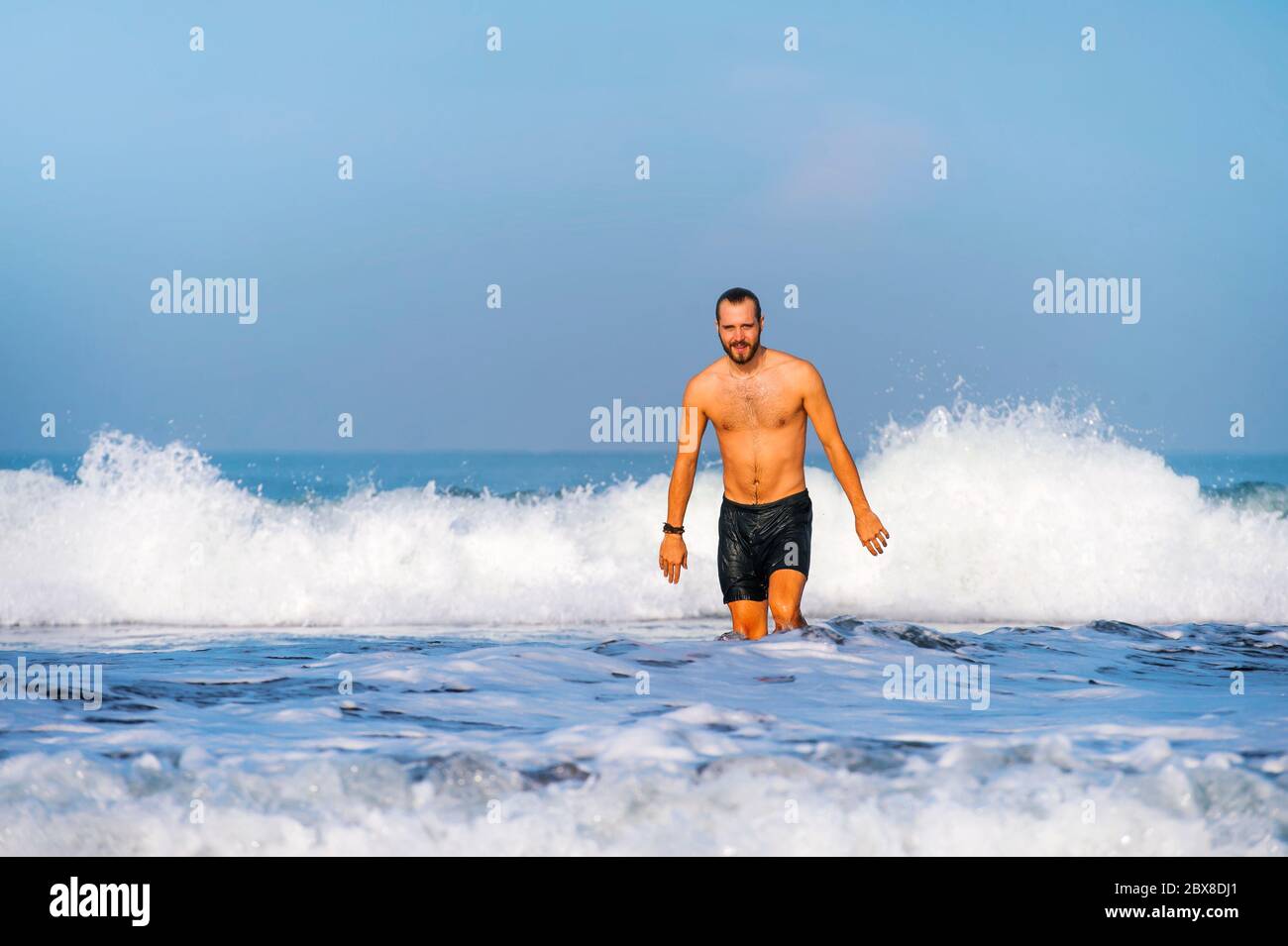 Man in swimming trunks isolated hires stock photography and images Alamy