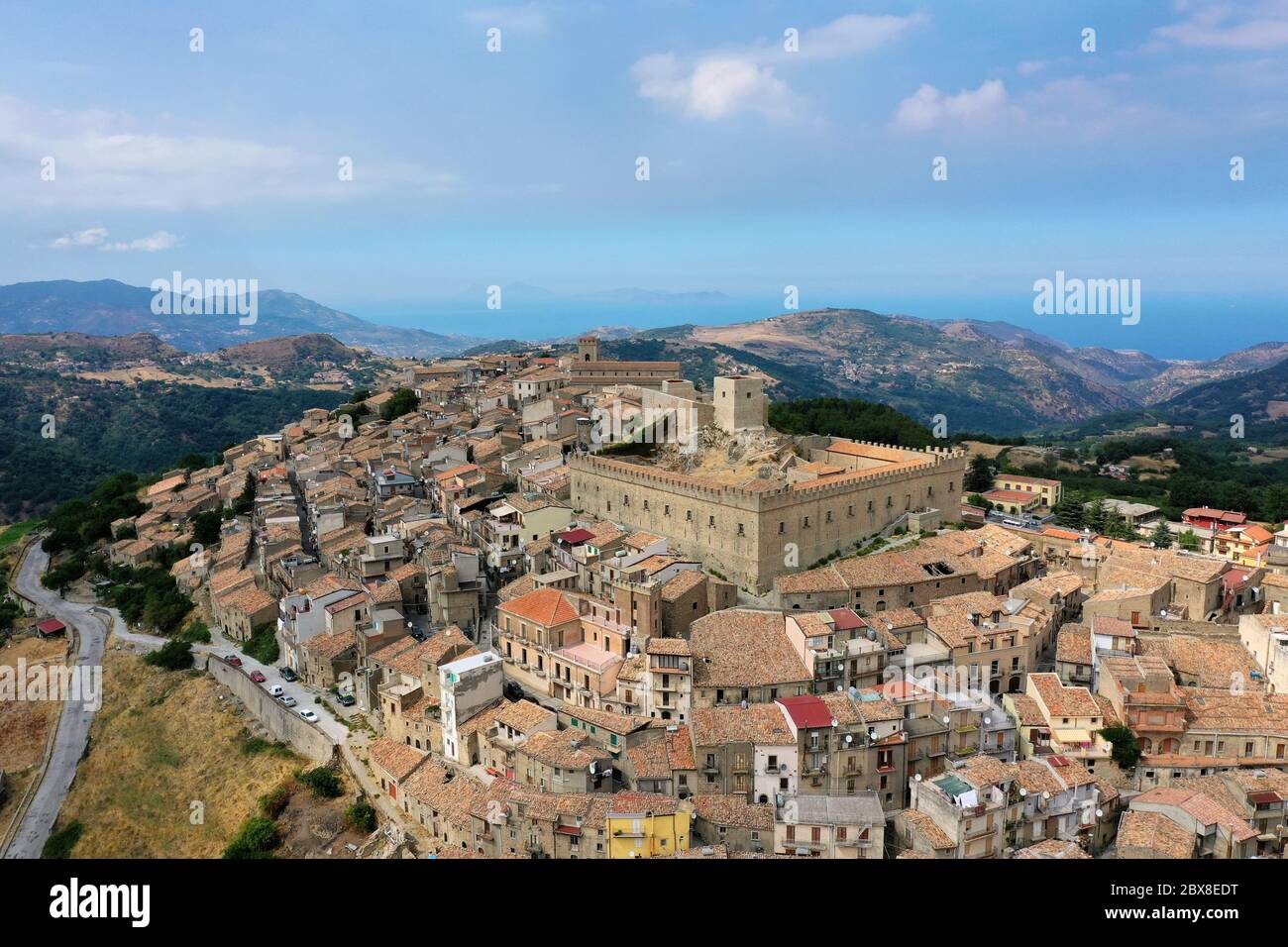Aerial view of the medieval town of Montalbano Elicona with the castle of Federico  II, photo taken with drone from the city of Montalbano in Sicily Stock  Photo - Alamy