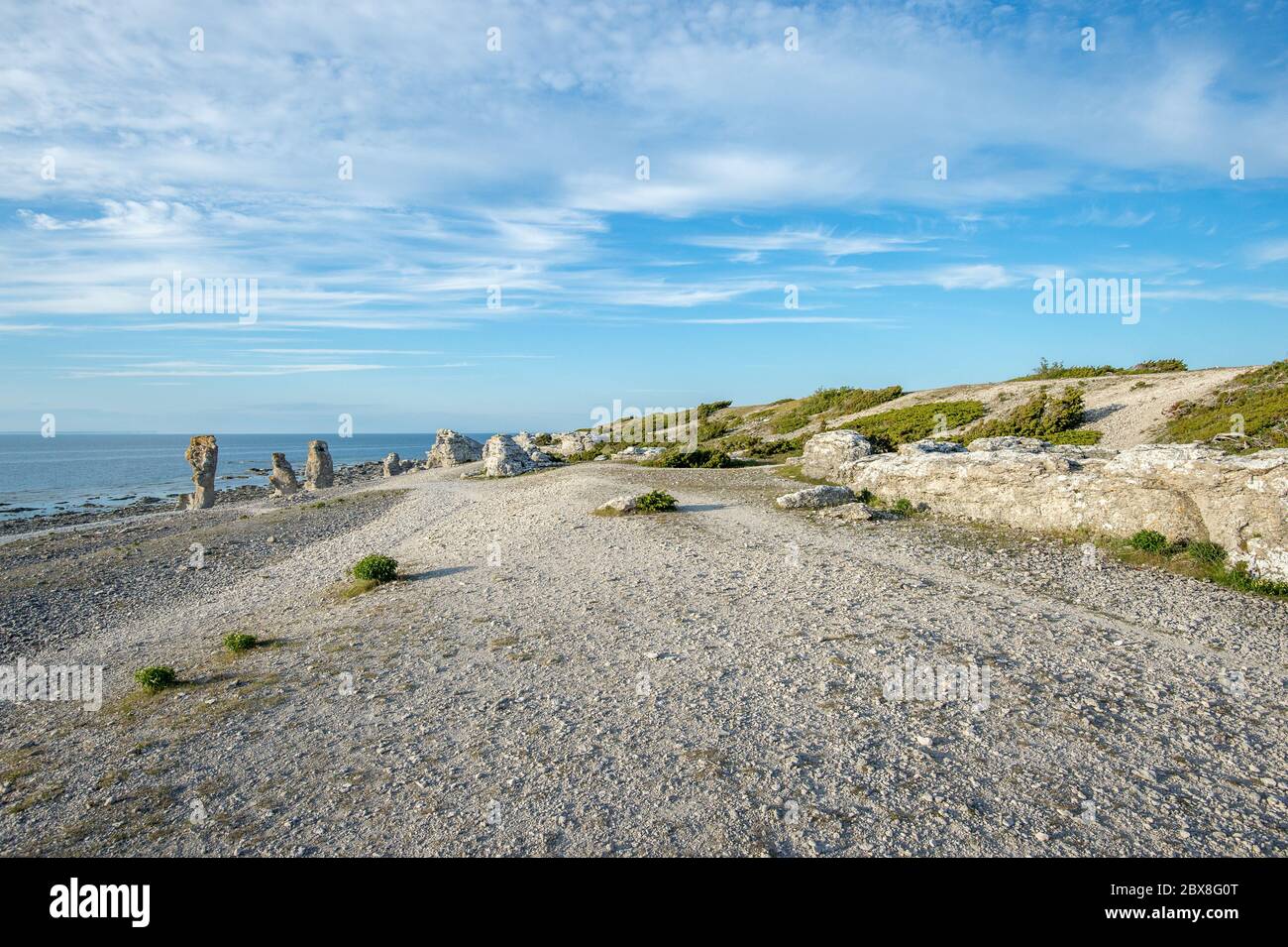 Langhammars on Fårö island in the Baltic sea. Langhammars is famous for its collection of limestone sea stacks. Stock Photo