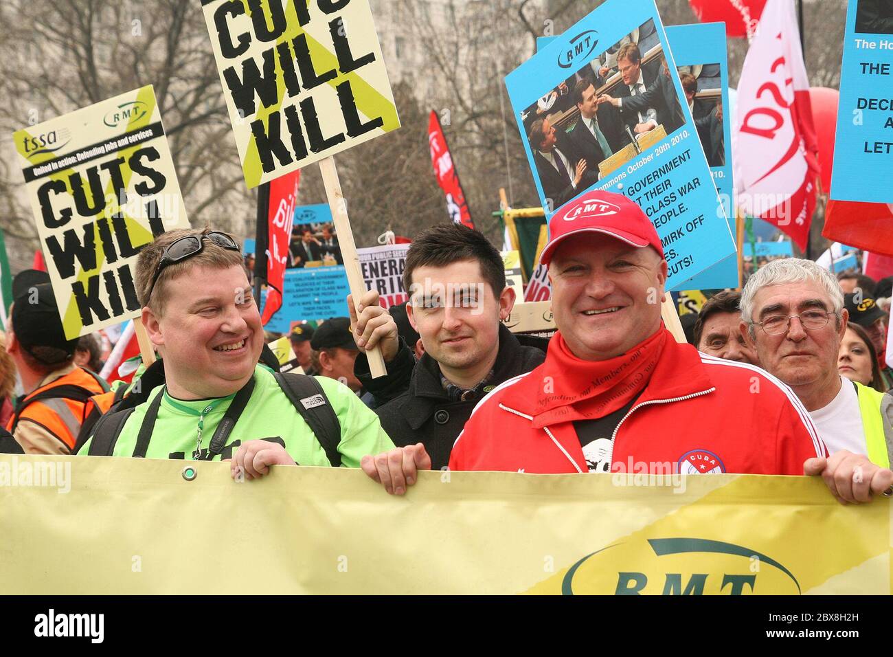 Bob Crow leader of the Rail Maritime and Transport Union (RMT)joins some 200 hundred thousand people - the largest protest in years - march through the streets of London England protesting over the planned government spending cuts. Stock Photo