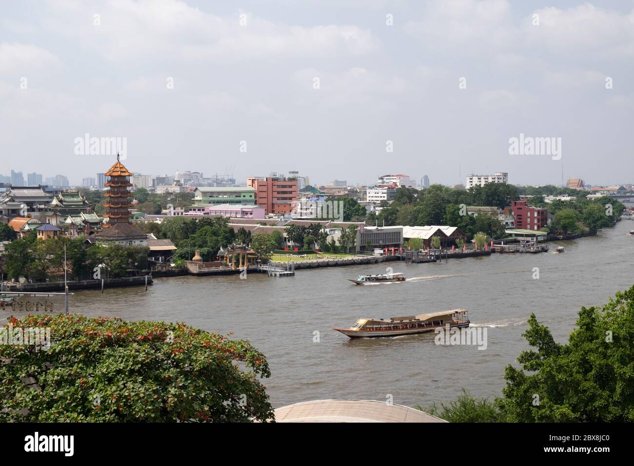 Sightseeing boat on the Chao Praya river, Bangkok, Thailand, Southeast Asia. Stock Photo