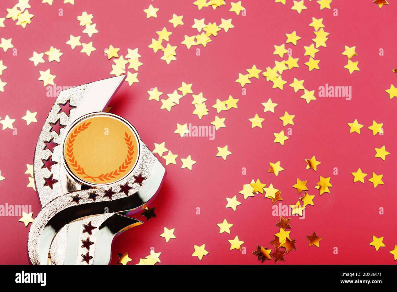 Golden Superprize with a scattering of stars on a red background Stock ...