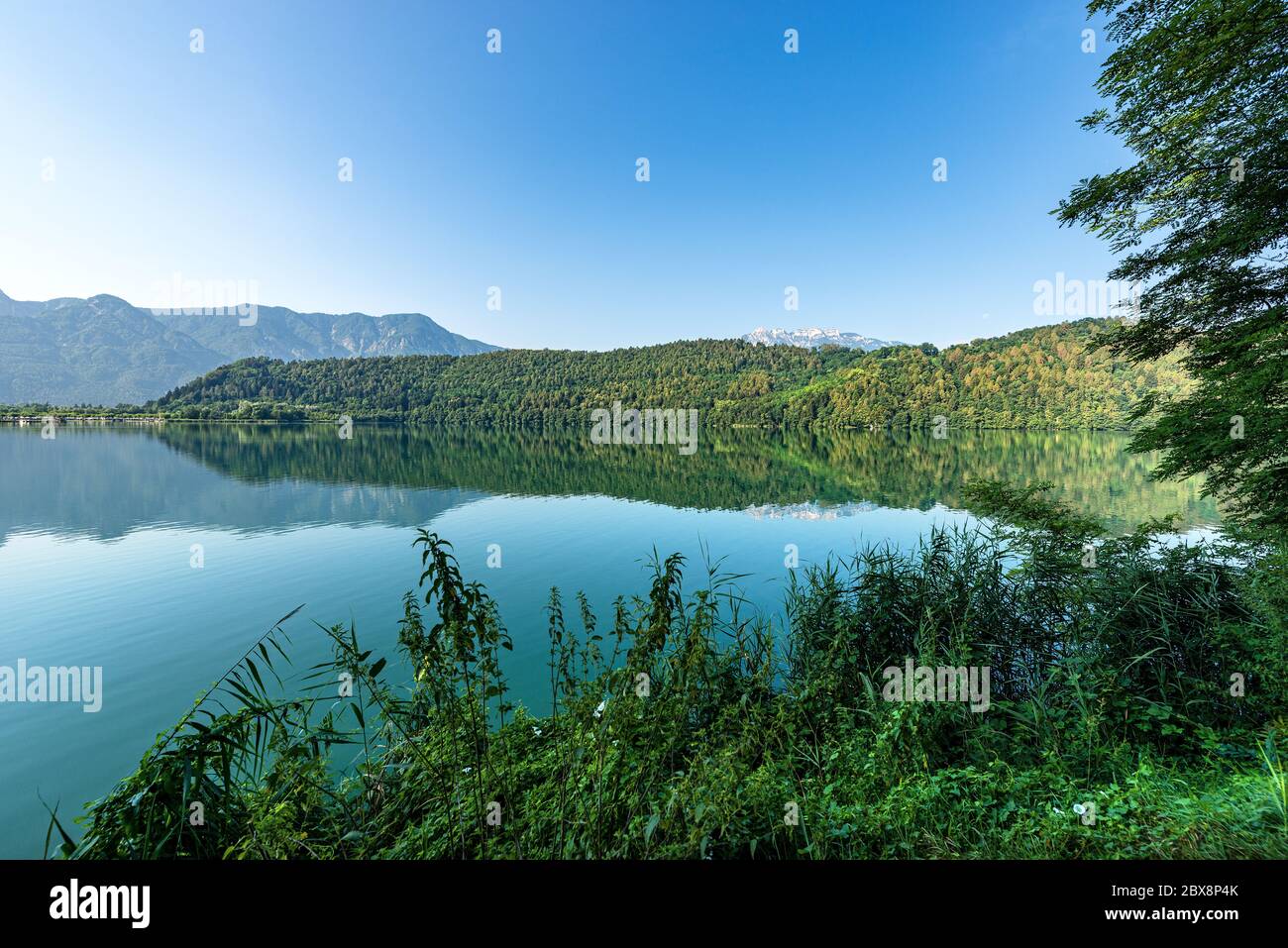 Lago di Levico, small beautiful lake in Italian Alps, Levico Terme town, Trento province, Trentino Alto Adige, Italy, Europe Stock Photo