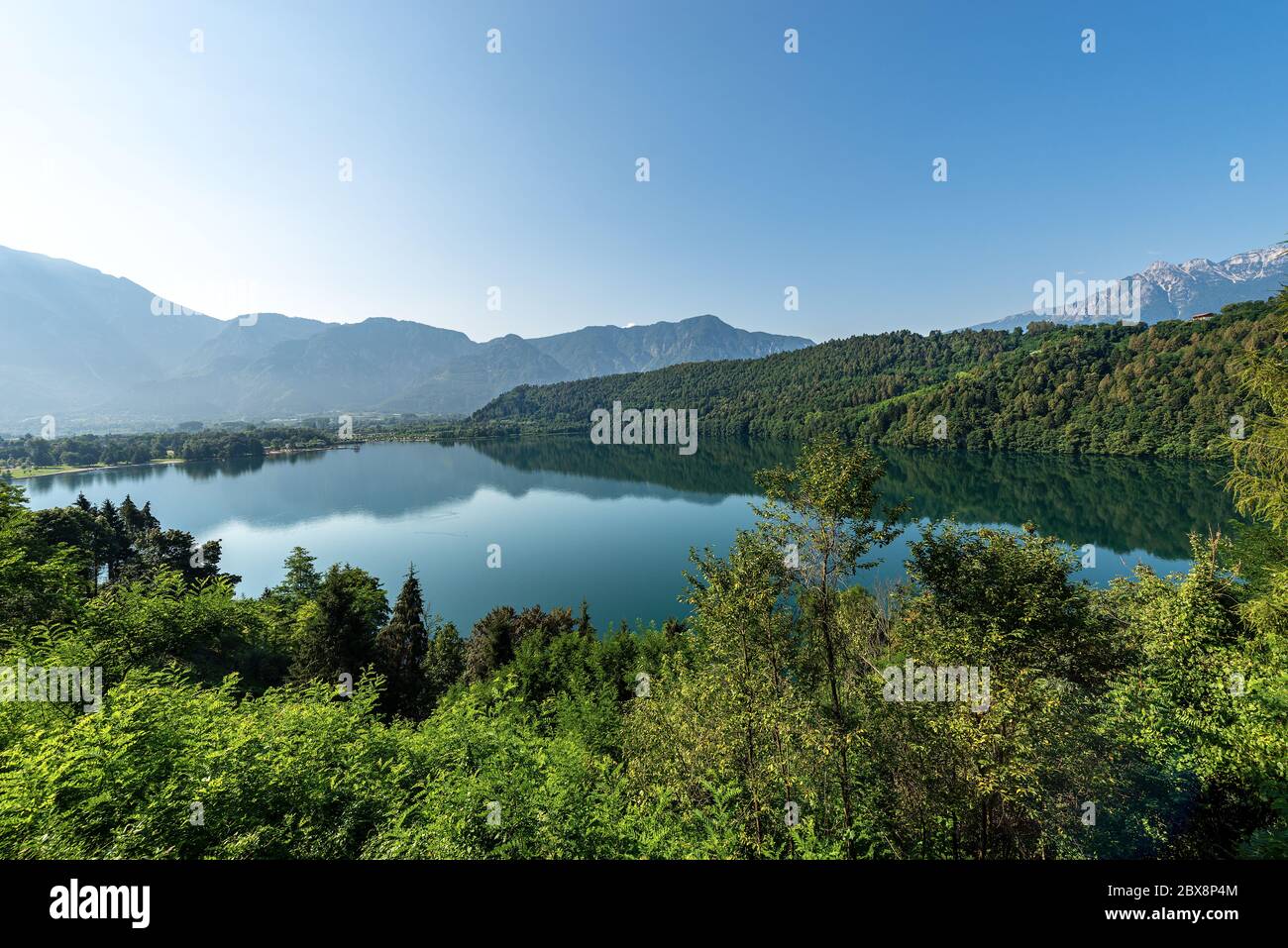 Lago di Levico, small beautiful lake in Italian Alps, Levico Terme town, Valsugana valley, Trento province, Trentino Alto Adige, Italy, Europe Stock Photo