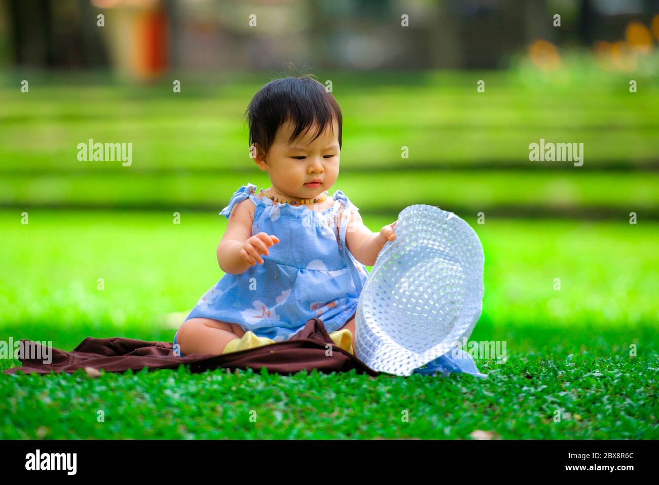isolated candid portrait of sweet and adorable Asian Japanese baby girl